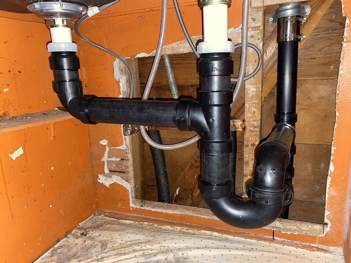Professional Garbage Disposal Repair equipment and tools on the job in Abingdon
